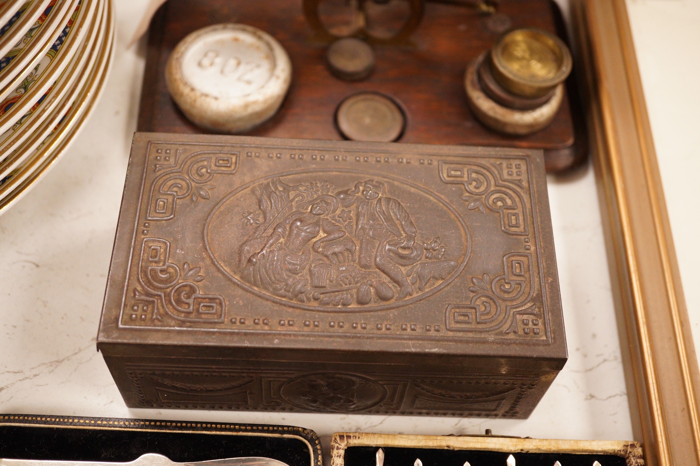 A postal scale, cased silver lobster picks, silver cocktail sticks etc